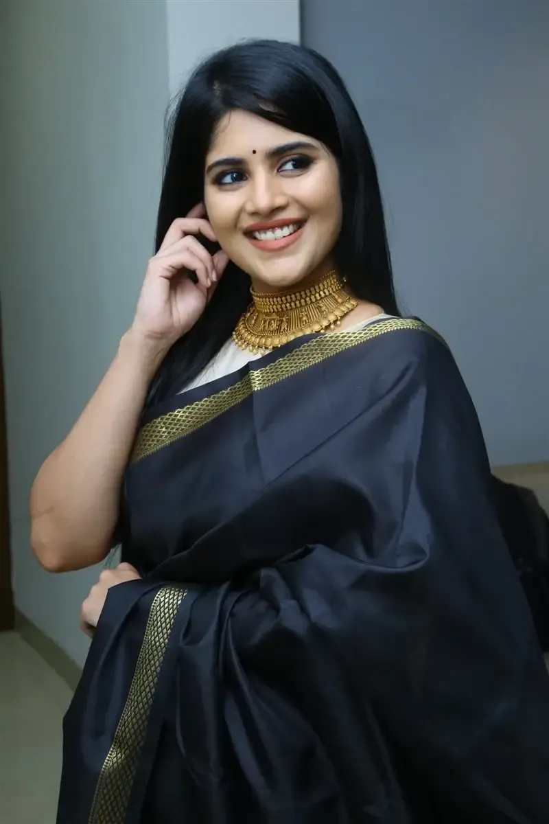 Megha Akash in Black Saree at Manu Charitra Telugu Movie Trailer Launch